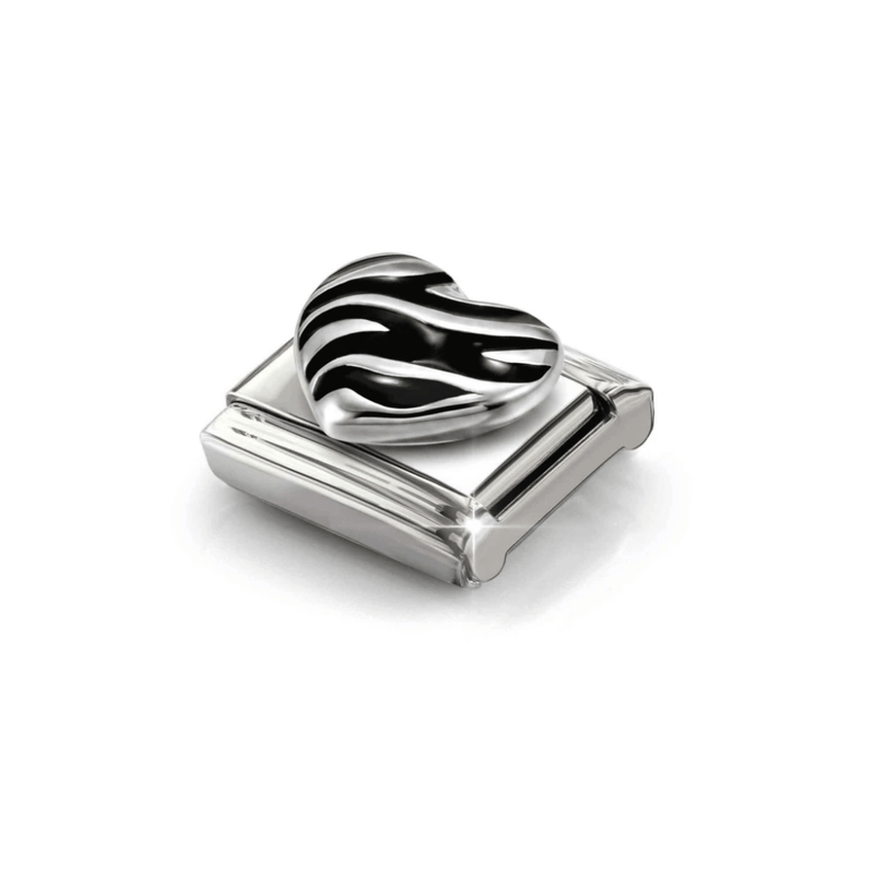 Angled close-up of Nomination Silver Tiger Heart Link showing flowing black enamel stripes across a sculpted silver heart.