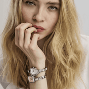 Nomination Time Paris watches styled on model with decorative Composable bracelet links and contrasting watch dial colours