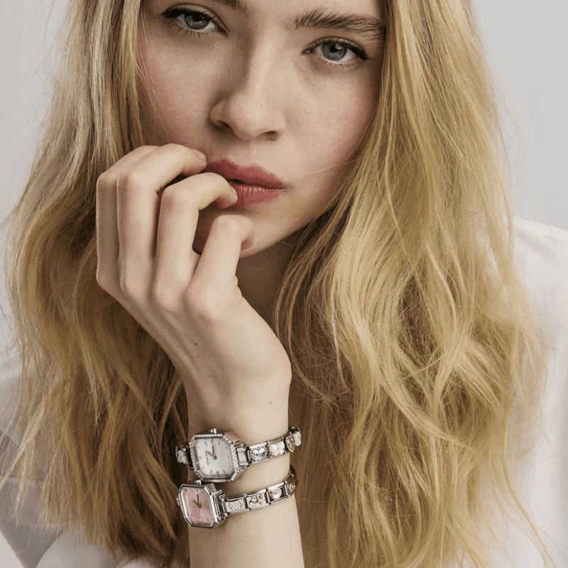 Nomination Time Paris watches styled on model with decorative Composable bracelet links and contrasting watch dial colours