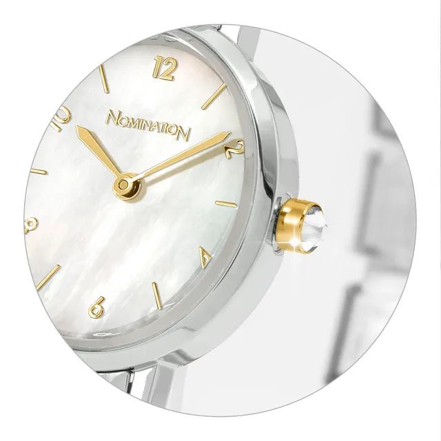 Close-up of Nomination Time round watch with mother-of-pearl dial, gold markers and crystal-set crown.
