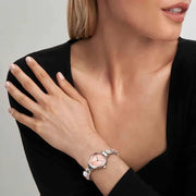Lifestyle shot of a Nomination Time watch on a Composable strap with pastel dial, worn on wrist.