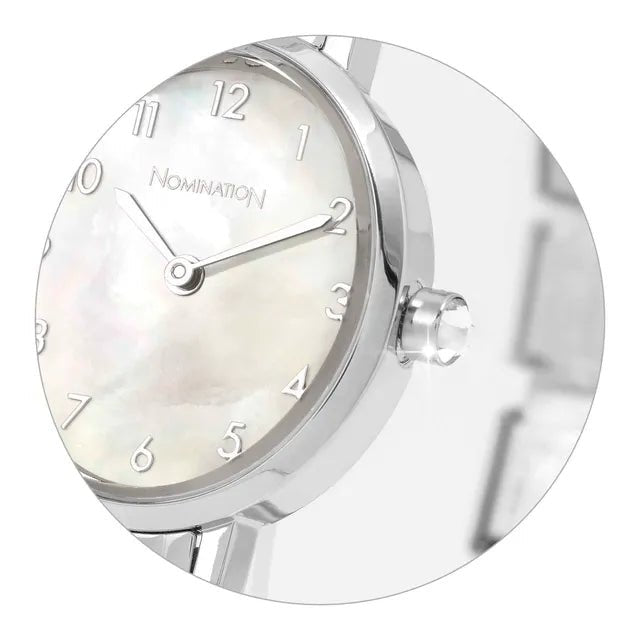 Close-up of Nomination Time watch with oval white mother of pearl dial and CZ-set crown on stainless steel strap.