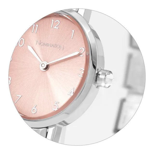 Close-up of Nomination Time watch with oval sunray pink dial and CZ-set crown on stainless steel strap.