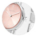 Close-up of Nomination Time watch with oval sunray pink dial and CZ-set crown on stainless steel strap.