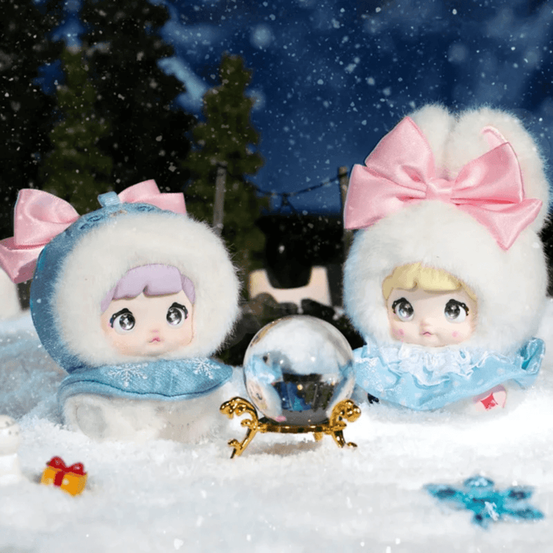 Nommi Fairytale Town plush characters displayed together in a snowy storybook scene