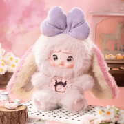 Reverie plush – candy‑floss pink suit, lavender bow and macaron core, blind box series.
