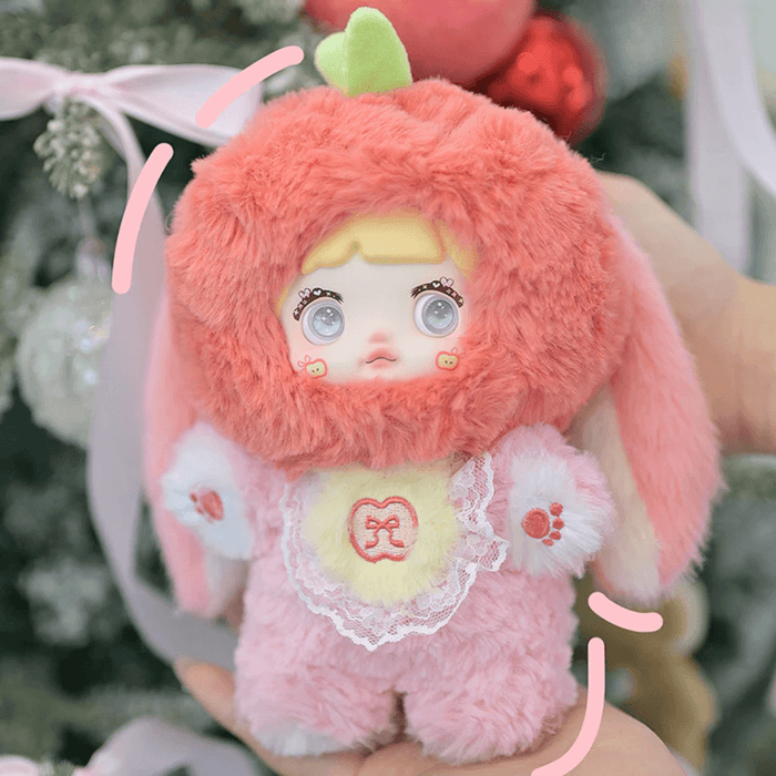 Apple Nommi – rosy‑red bunny hood with apple stem, pink paws and embroidered heart‑core.

