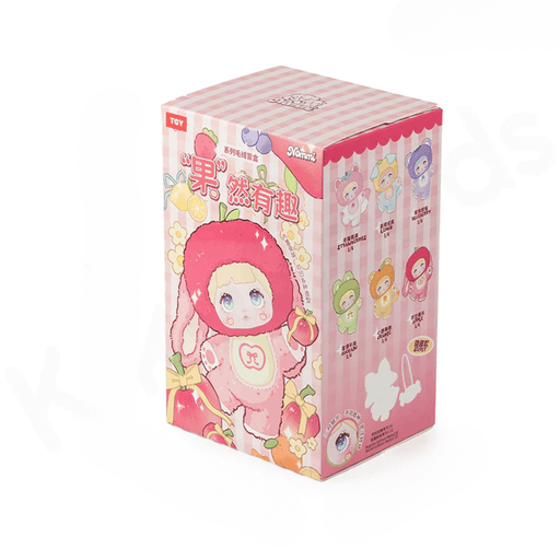 Pink Nommi Interesting Fruits blind‑box packaging with line‑art of the fruit characters.
