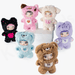 All six Nommi Loveliness plush figures posed together on white blocks, showing full color range.

