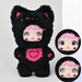 Raspberry Cat MIMI plush in black‑and‑pink fur; inset circles display color‑changing eyes.
