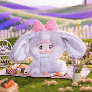 Taro Paste Bunny Nommi Sitting Zoo plush in a fluffy lavender bunny costume