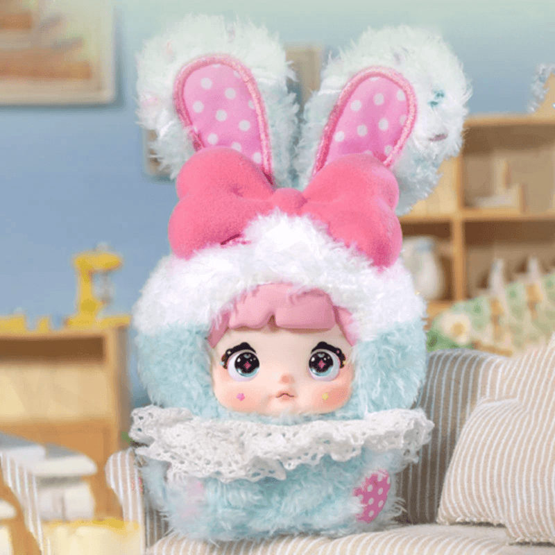 Frost Cream Nommi Sweetheart Bunny plush in pale blue with a large pink bow