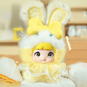 Pudding Cream Nommi Sweetheart Bunny plush in soft yellow with bunny ears and bow