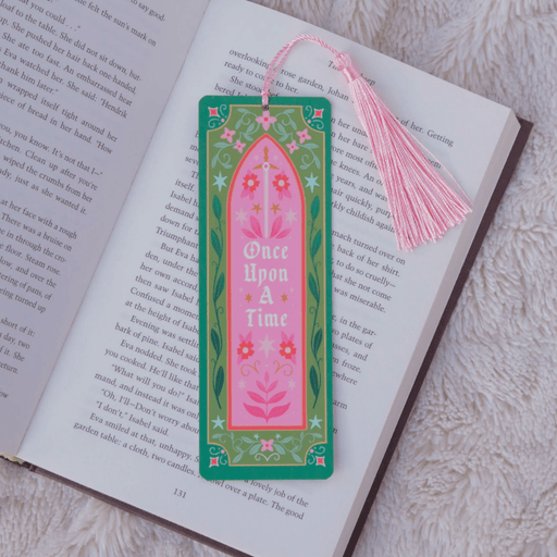 Once Upon A Time floral bookmark with tassel inside an open book