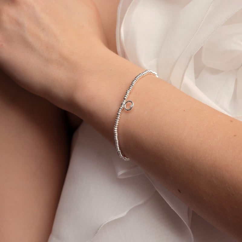 “Model wearing One in a Million diamond circle bracelet by Joma Jewellery”
