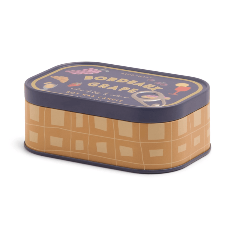 Side view of Paddywax Bistro Bordeaux Grape tin candle with faux pull-tab lid