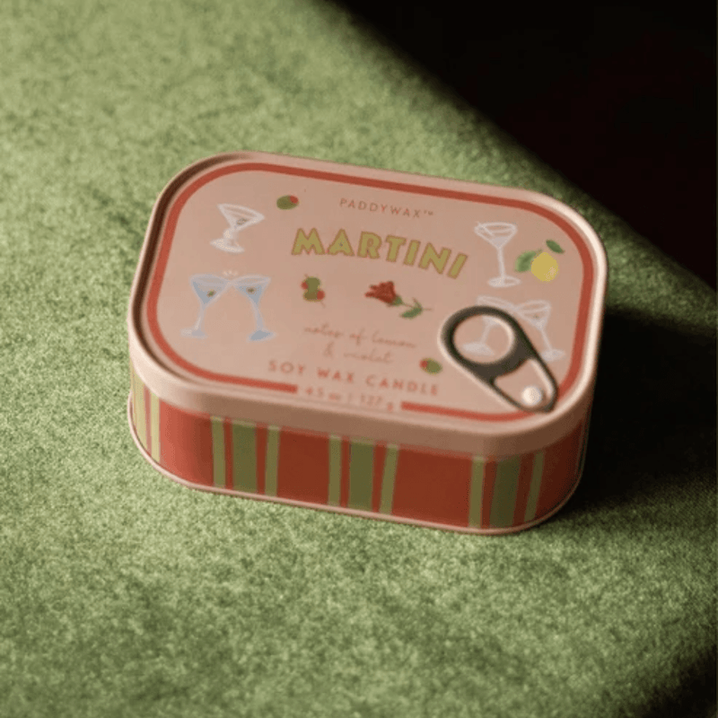 Paddywax Bistro Martini tin candle displayed on green background