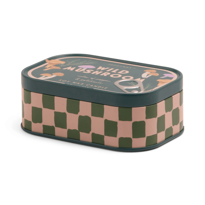 Side view of Paddywax Bistro Wild Mushroom tin candle with green checkerboard design