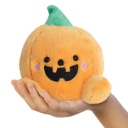 Palm Pals Carver pumpkin soft toy sitting in a hand

