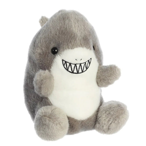 Front view of Palm Pals Chomps Shark plush toy with big toothy grin.

