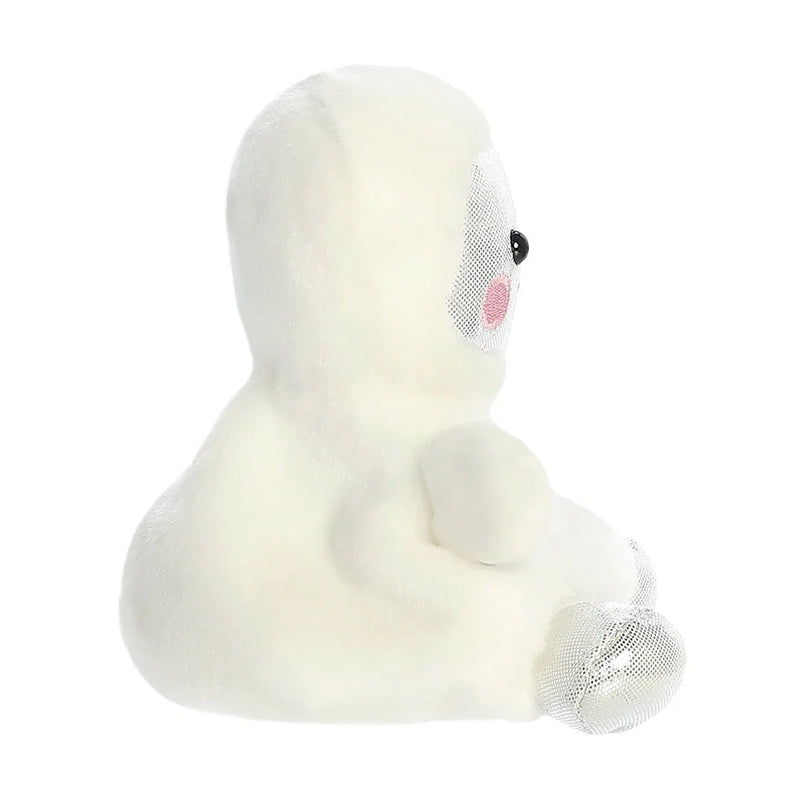 Side view of Palm Pals Cosmo Astronaut plushie showing white suit and silver boot