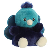 Angled view of Palm Pals Elton Peacock plushie showing sparkly peacock tail