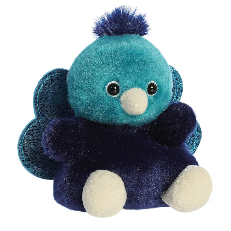 Angled view of Palm Pals Elton Peacock plushie showing sparkly peacock tail