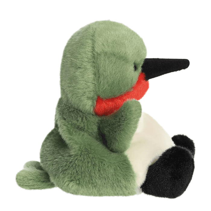 Side view of Palm Pals Hilda Hummingbird soft toy showing black beak and cream tummy