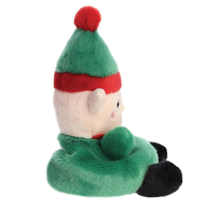 Side profile of Jolly Elf plush with pointed ear and pom-pom paw