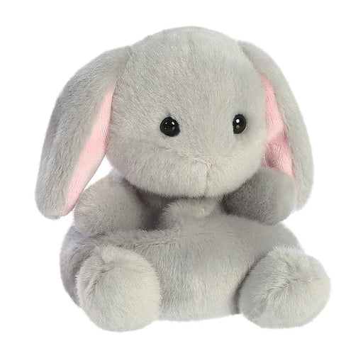Angled front view of Palm Pals Pebbles Bunny plushie with floppy ears