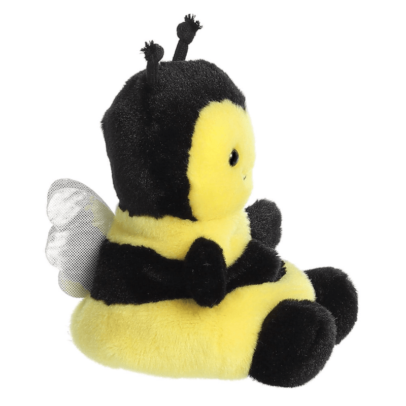 Side view of Palm Pals Queenie Bee black and yellow soft toy