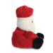 Side profile of Santa Claus plush with red suit and soft beard