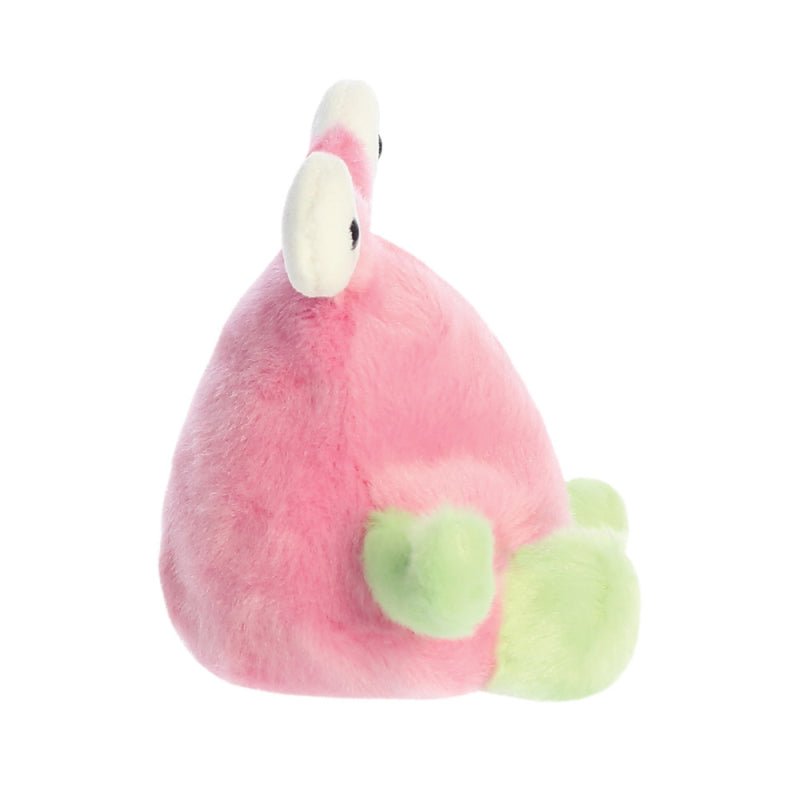 Side profile of Silly Alien plush with raised eye stalks and green paw