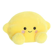 Angled view of Palm Pals Yuzu Lemon plush toy by Aurora