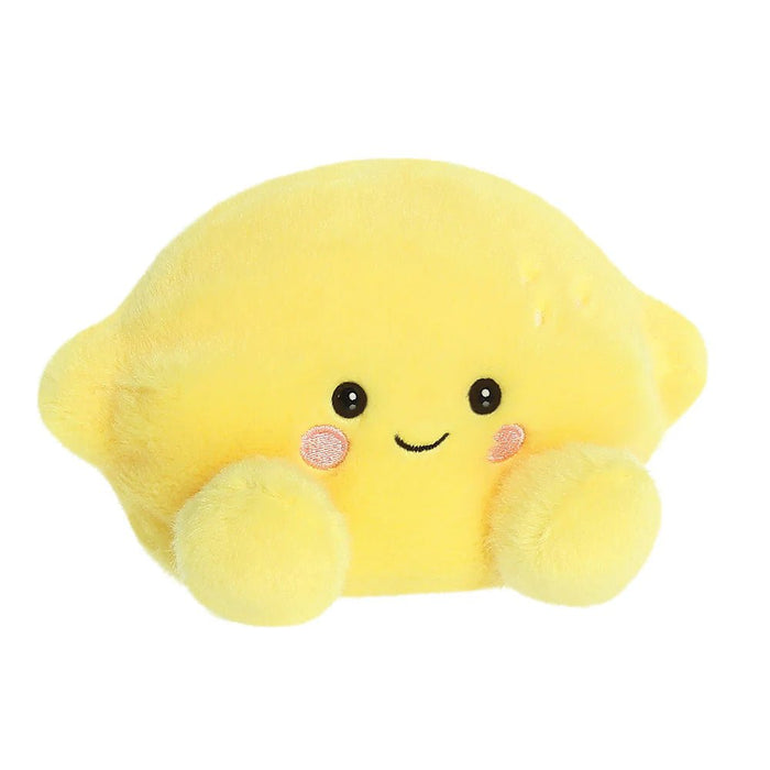 Angled view of Palm Pals Yuzu Lemon plush toy by Aurora