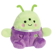 Angled view of Palm Pals Zorg plushie with rosy cheeks and planet patch.