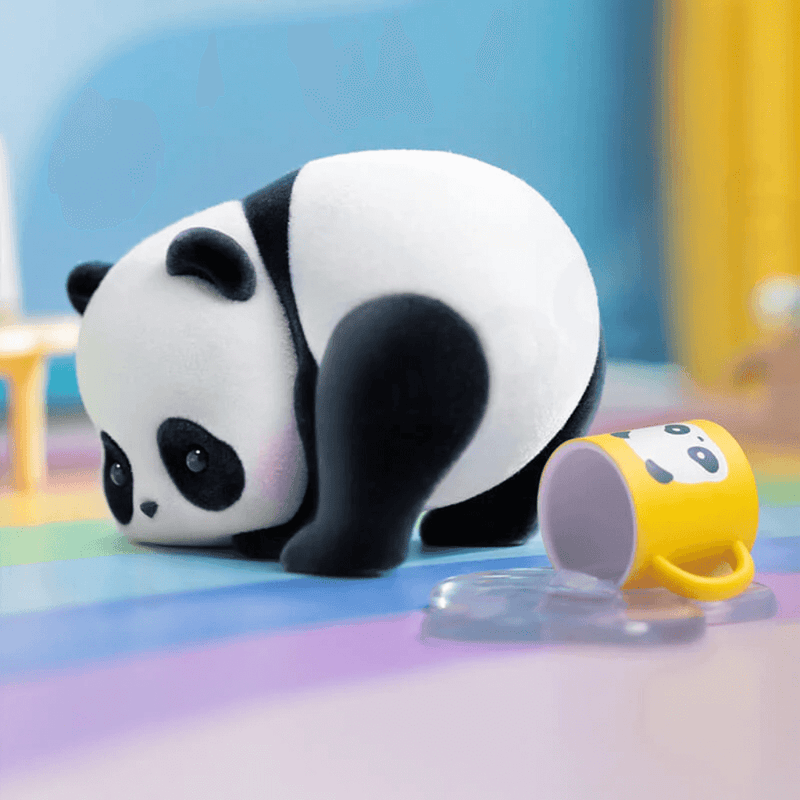 Cat Panicking design: panda inspecting a spilled yellow cup – Panda Roll Blind Box collectable
