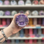 Parma Violet wax melt pot with purple sweet shop label