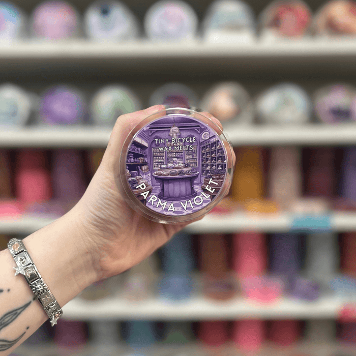 Parma Violet wax melt pot with purple sweet shop label