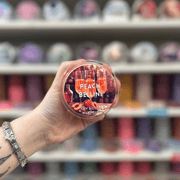 Peach Bellini wax melt pot with peach cocktail label