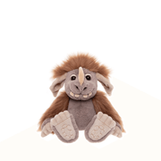 Pebble Bearhouse by Charlie Bears ogre plush toy, front view on white background with brown fluffy hair and tusk-like toothy grin