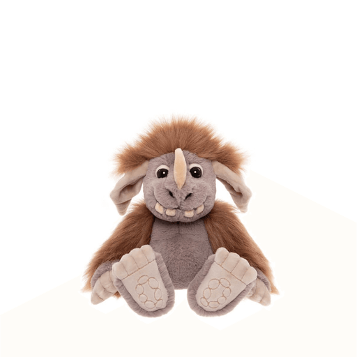 Pebble Bearhouse by Charlie Bears ogre plush toy, front view on white background with brown fluffy hair and tusk-like toothy grin