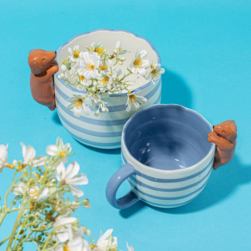 Blue striped Peeking Sausage Dog Mug with speckled stoneware finish in a bright lifestyle scene