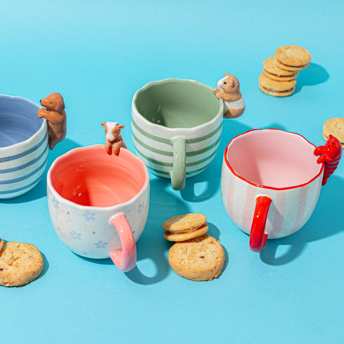 Peeking Sausage Dog Mug shown with other peeking character mugs on a blue background