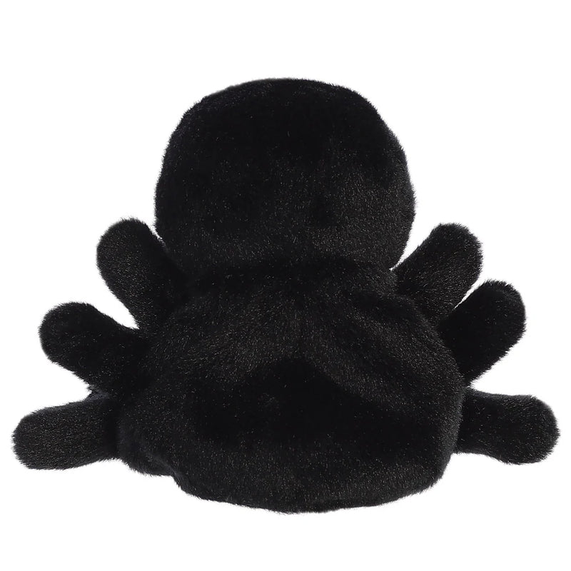 Palm Pals Penny Mae Spider plush toy with raised legs and smiling fanged face, angled view.