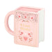 Front view of pink ceramic I Love Books book shaped mug