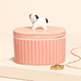 Pink oval ceramic dog trinket pot with striped design and 3D dog lid