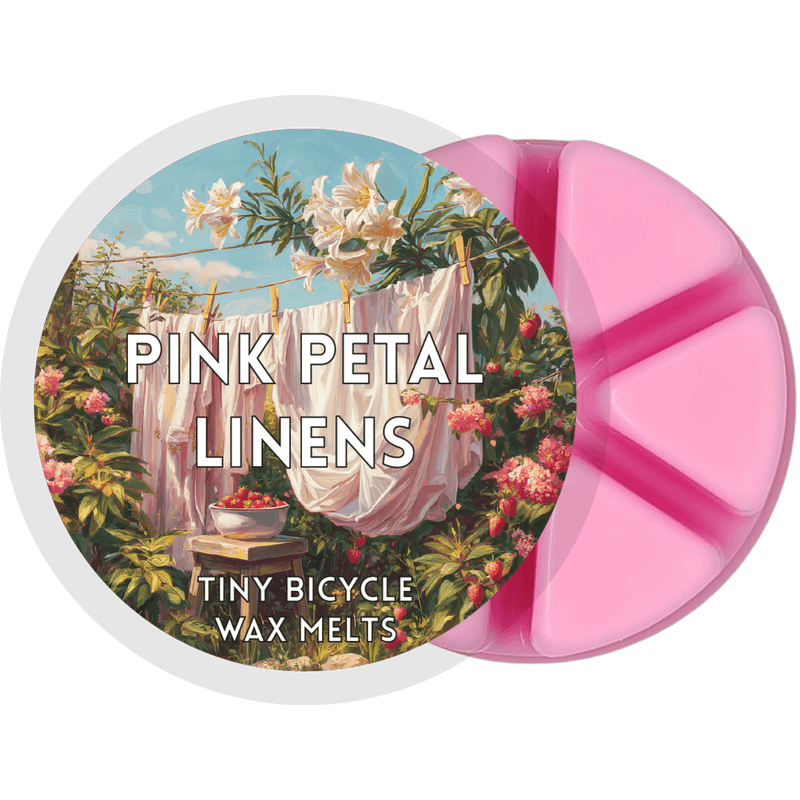 Pink Petal Linens wax melt pot with six pink segments and floral laundry-day label