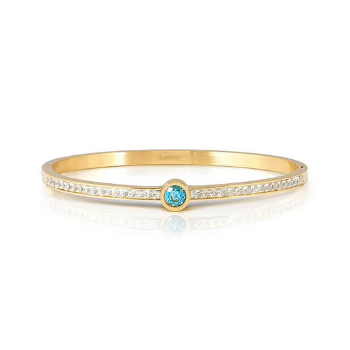 Gold tone stainless steel hinged bangle bracelet with white cubic zirconia and a light blue centre stone