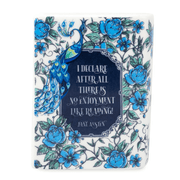 Top angled view of Pride and Prejudice book candle showing wick and printed wax label.